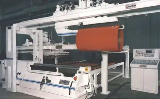 Spécial EMO 2005 : une rouleuse à 4 rouleaux sur le stand FACCIN
