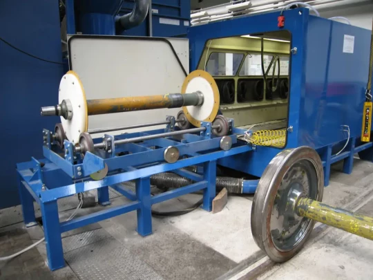 WHEELABRATOR Group propose une solution économique  pour le décapage des essieux