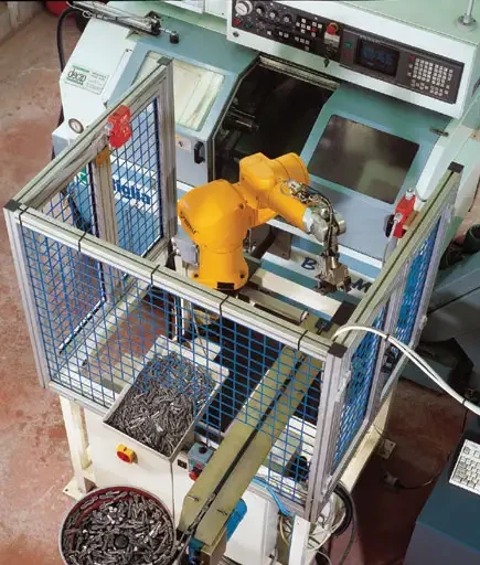 Spécial EMO 2003 : les robots de la gamme RX en démonstration chez STAUBLI