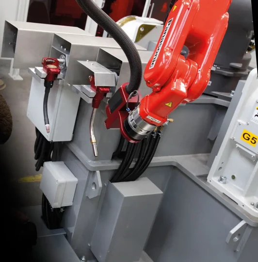 Changement de torche entièrement automatisé sur un robot de soudage