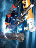 Spécial EUROBLECH 2004 : une solution robotisée complète avec technologie à haute performance laser hybride (rayon laser et arc de soudage) est présentée par CLOOS