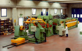 Spécial EMO 2005 : sur le stand IRON, sera présentée une Ligne de Poinçonnage de Coil Punchpress, travaillant Bande 500 x 3 mm pour la réalisation des divers types d'étagères industriels